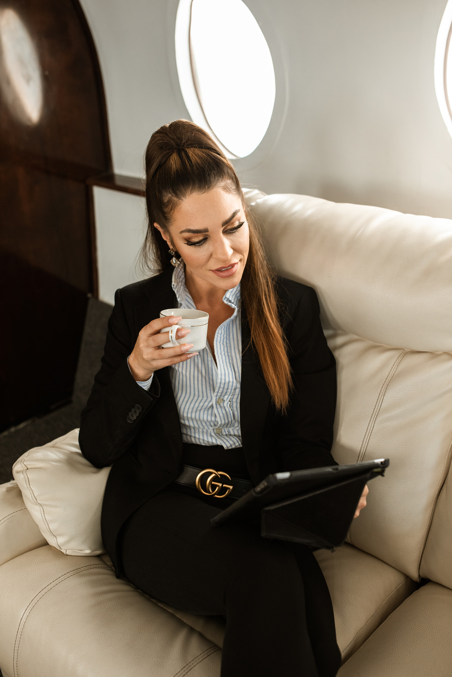 Business Woman looking at an Ipad 