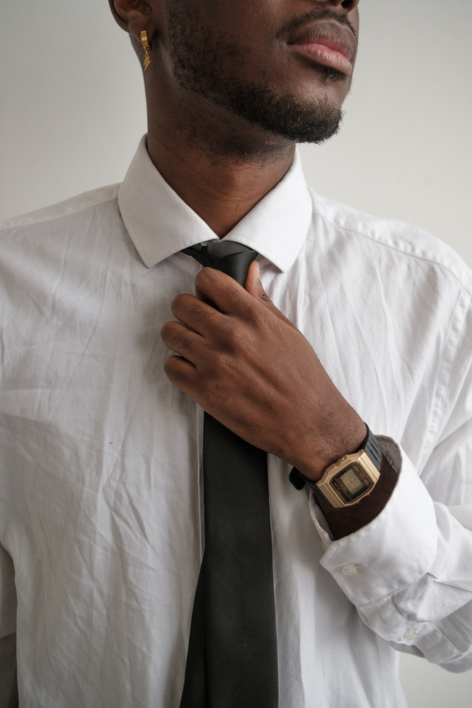 Man in White Dress Shirt and Black Tie