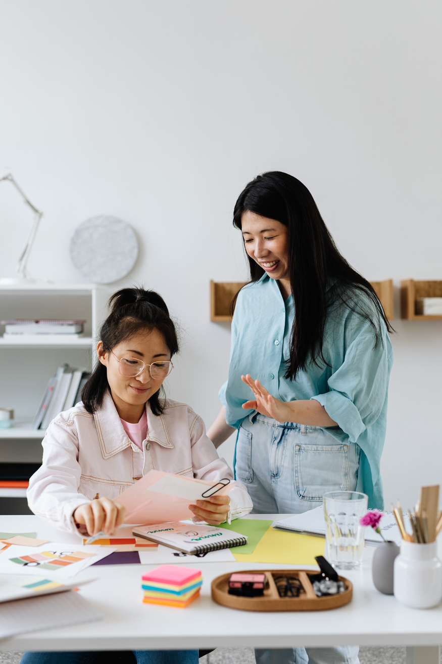 Two Women Working Together